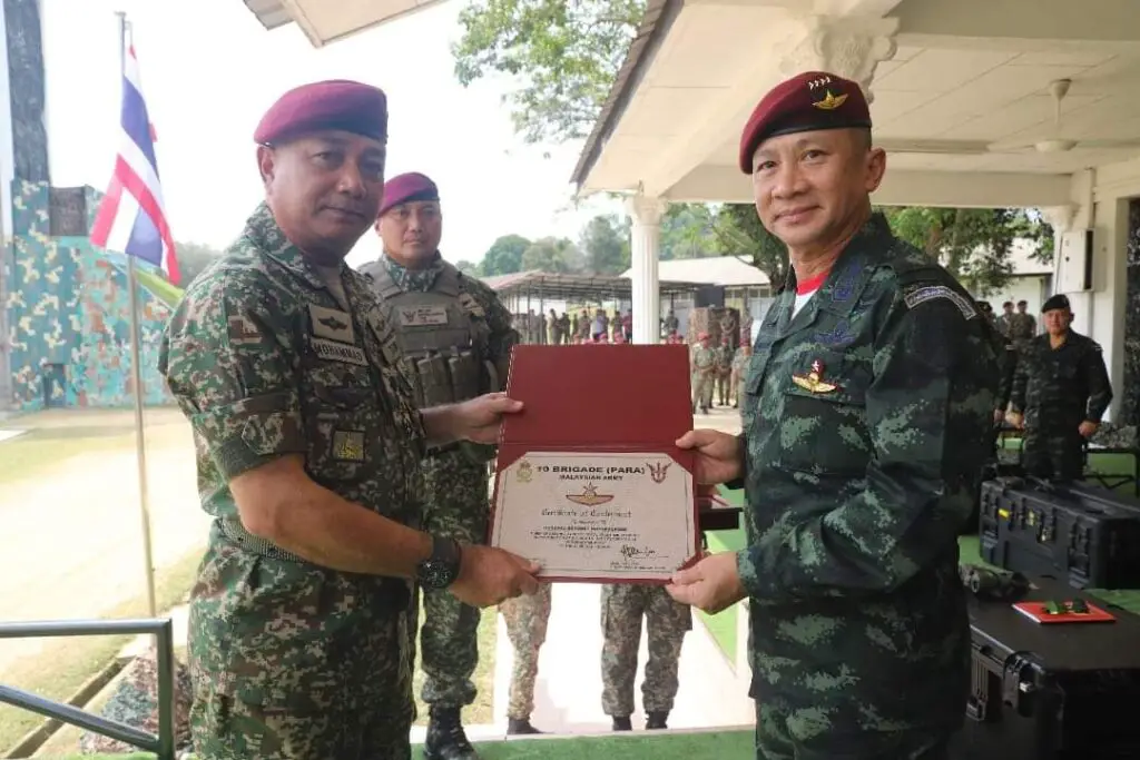 Presentation of the Honorary Maroon Beret and Senior Parachute Wing to ...